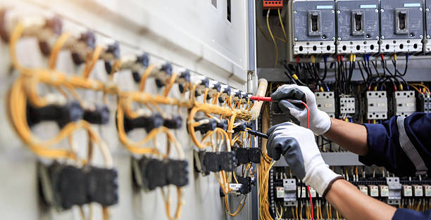 Professional Electrician technician working in Collins, MS